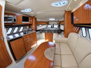 Luxury cabin interior aboard Prime Time Boat Charters with sleeping and lounge area